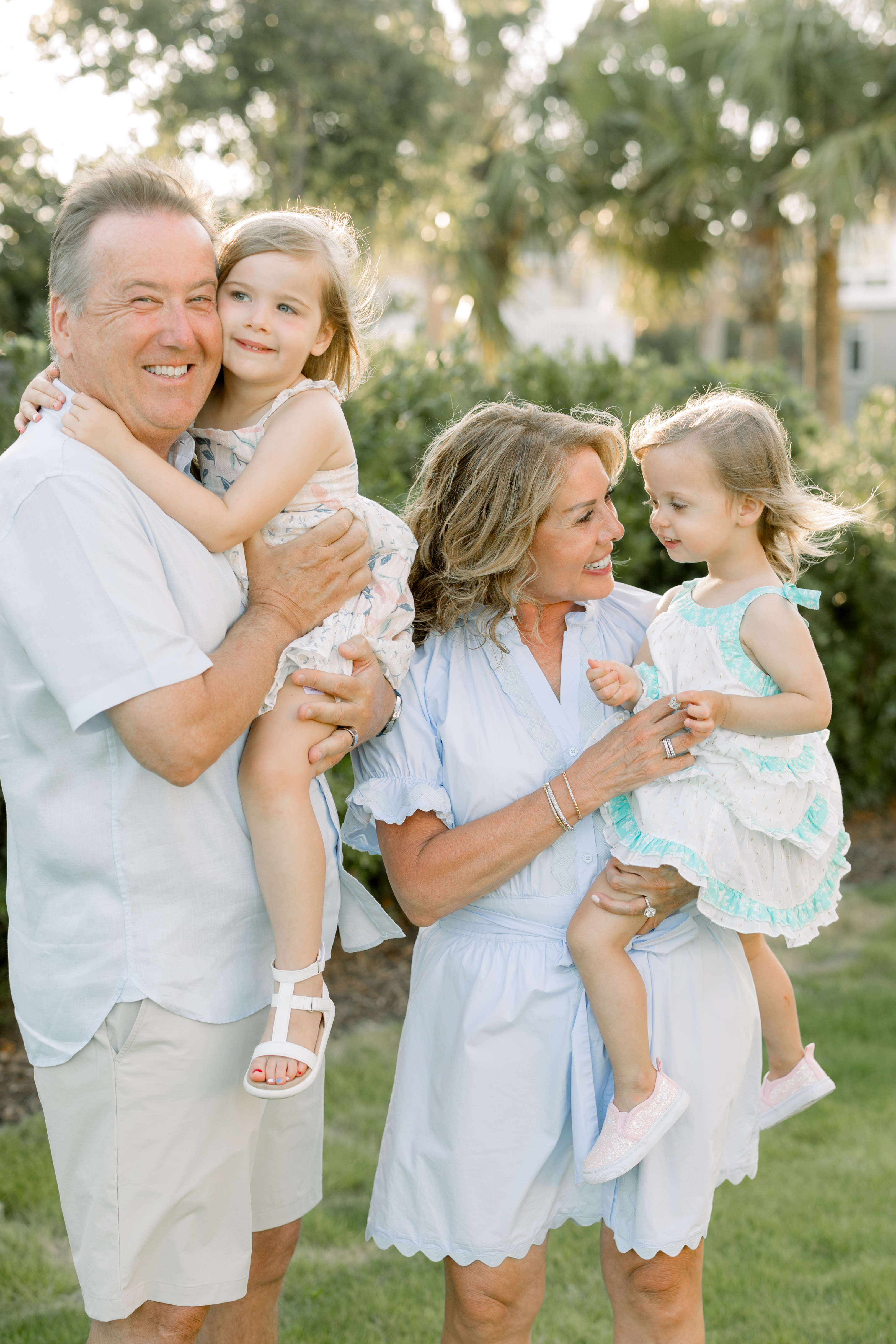 Mike and Mary Lamach with granddaughters Mia and Sophie.