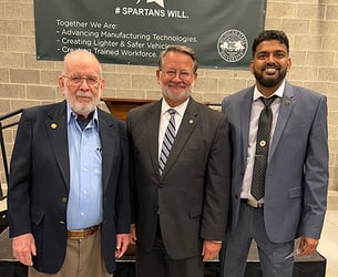 Professor Emeritus Gary Cloud (left) worked on composite materials research at MSU for decades. He stands with U.S. Senator Gary Peters and Mahmood Haq, CVRC director and co-investigator on the new $9 million project with the U.S. Army.