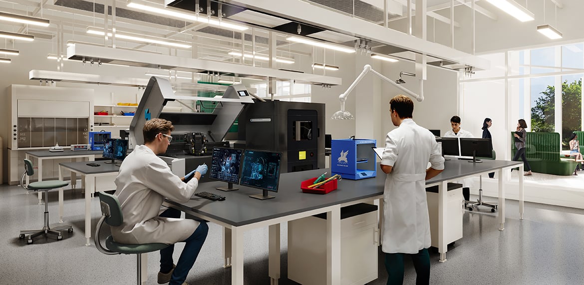 Research lab with workstations, advanced equipment, and people in lab coats working.