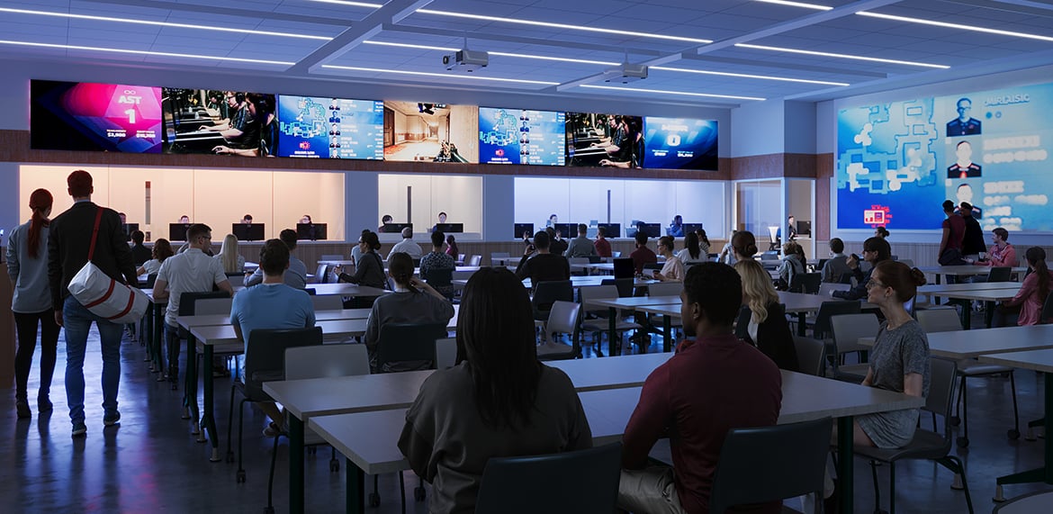 Esports arena-style room with multiple screens showing gaming visuals and audience seating.