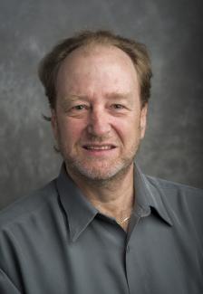 Headshot of Adrian Blow.