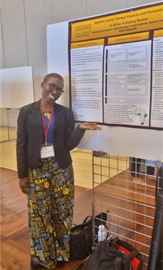 Pendo Galukande presents her research poster.