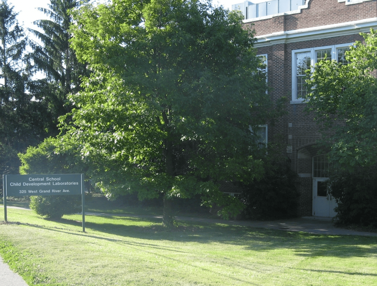 Brick building with tree.