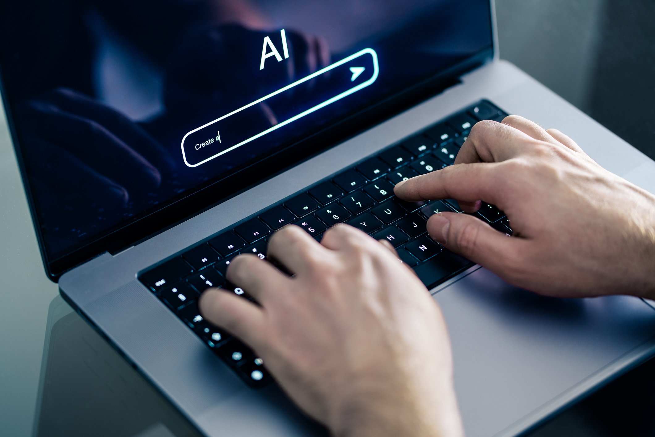 A laptop with AI displayed on the screen.