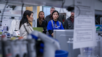 event participants touring a MSU lab
