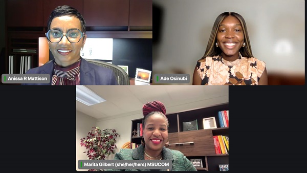 two female hosts and female filmmaker looking at the screen and smiling