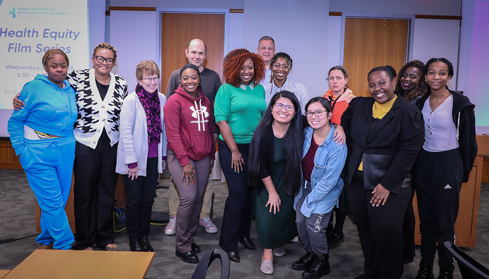 attendees of th event pose for a photo