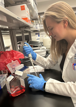 Jordan Kreger in the lab doing tests.