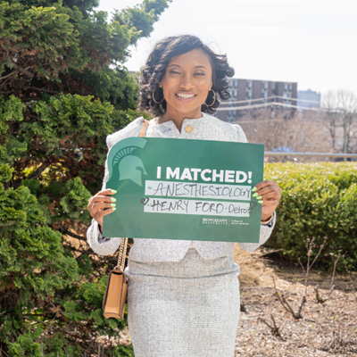 Kyra Orton holding her match day sign.