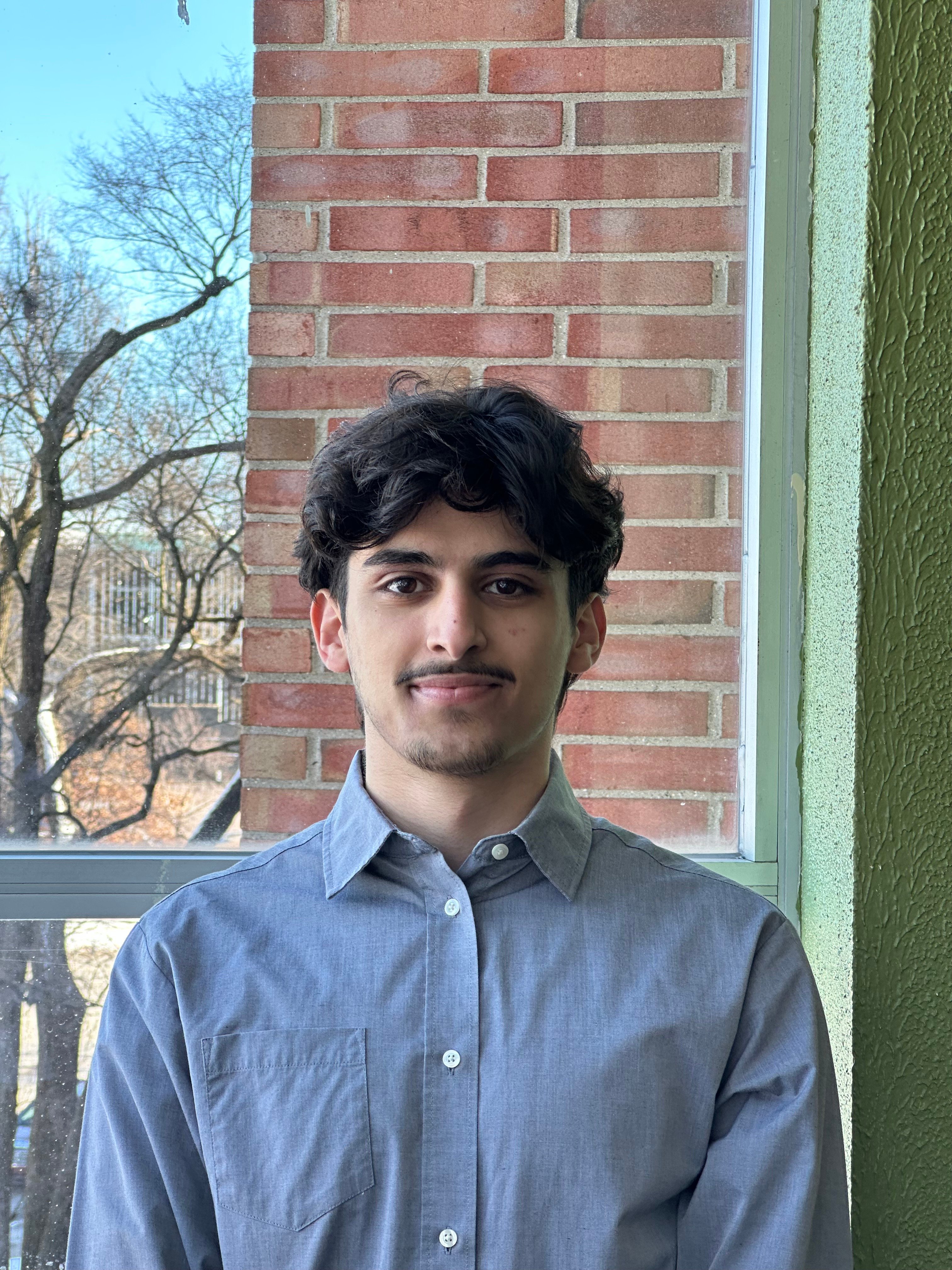 Aljirafi_Malik_Photo