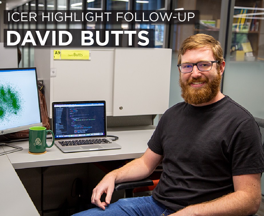 David Butts sitting at his desk with a laptop and computer.