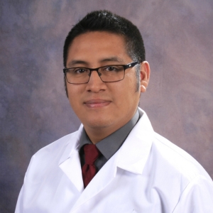 A headshot photo of Dr. Ruben Kenny Briceno