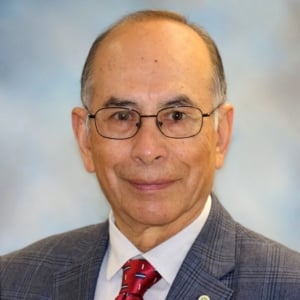 A headshot photo of doctor Rene Hinojosa
