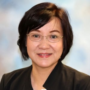 A headshot photo of doctor Qing Xia