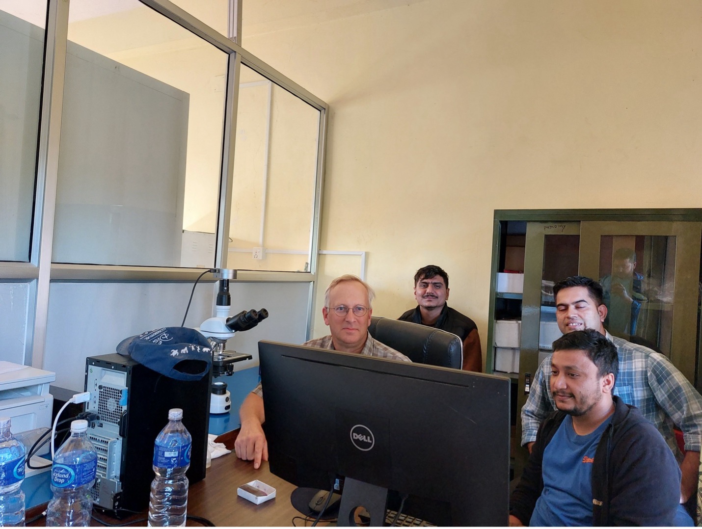 MSU researcher Dalen Agnew working with a team of veterinary researchers in Nepal.