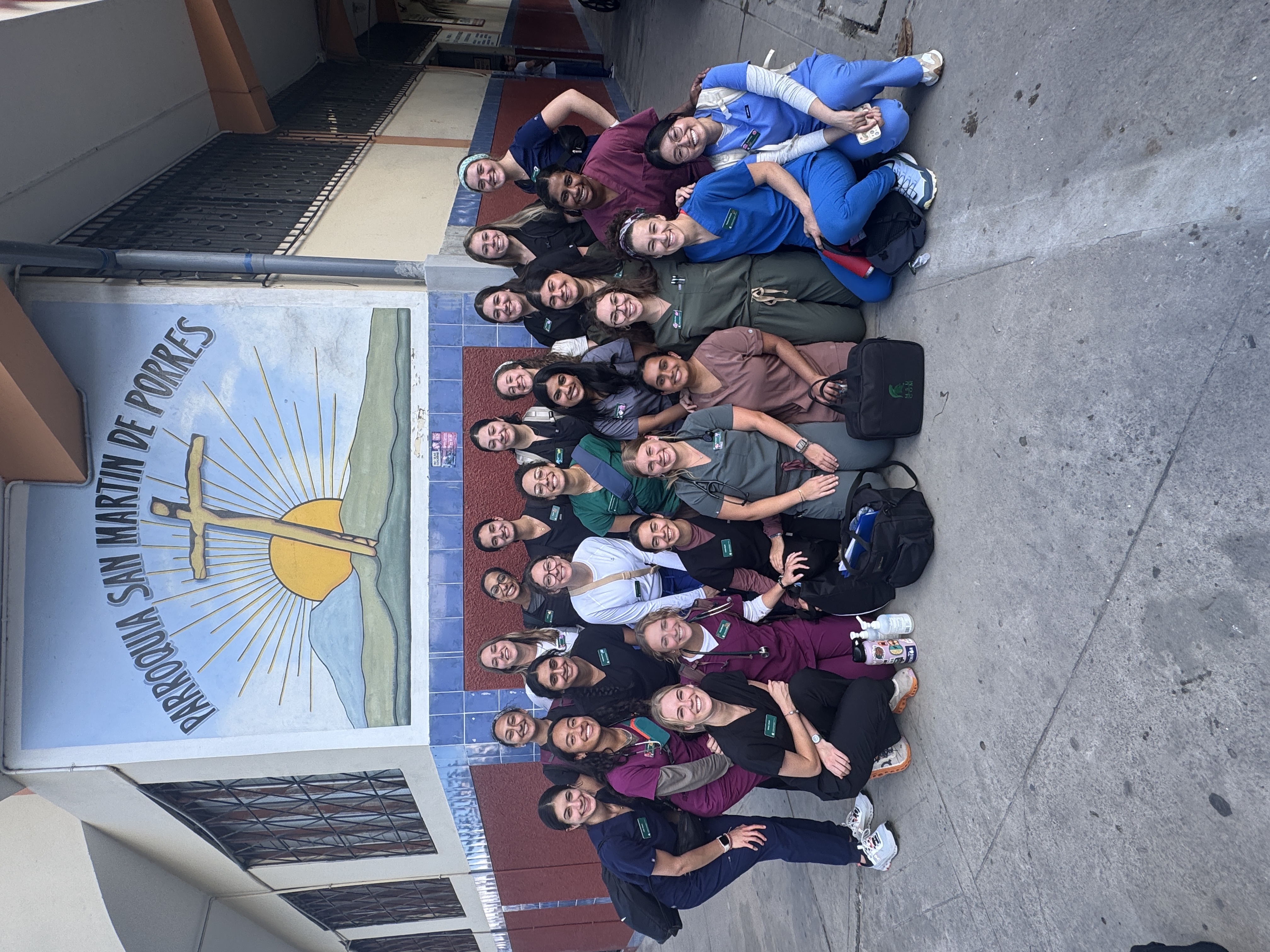 Lilja Plumert taking a group picture with fellow MSUCOM medical students in front of a church in Peru.
