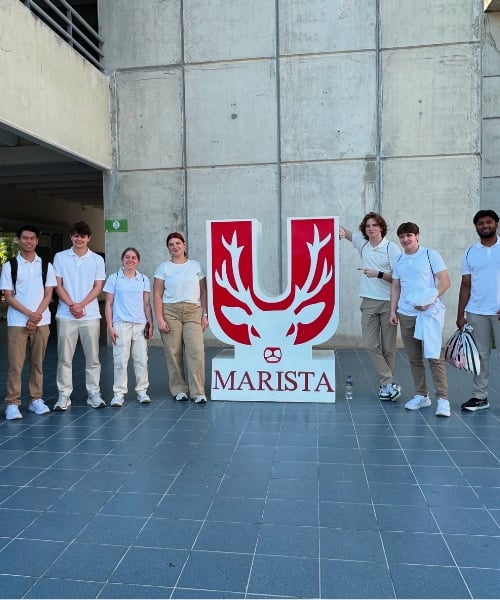 A group of Michigan State University medical students standing outside of Marist University of Merida in Mexico