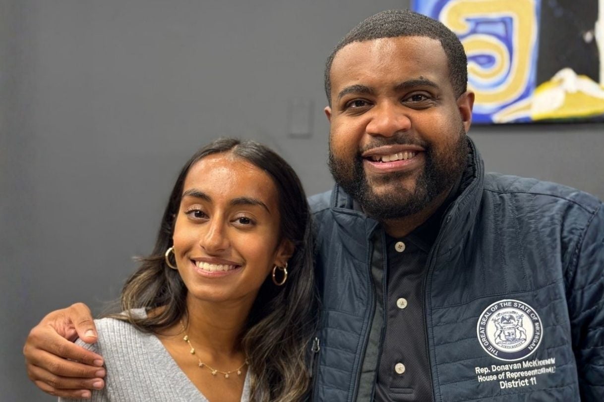 Krisha Patel next to Michigan State Representative Donavan McKinney