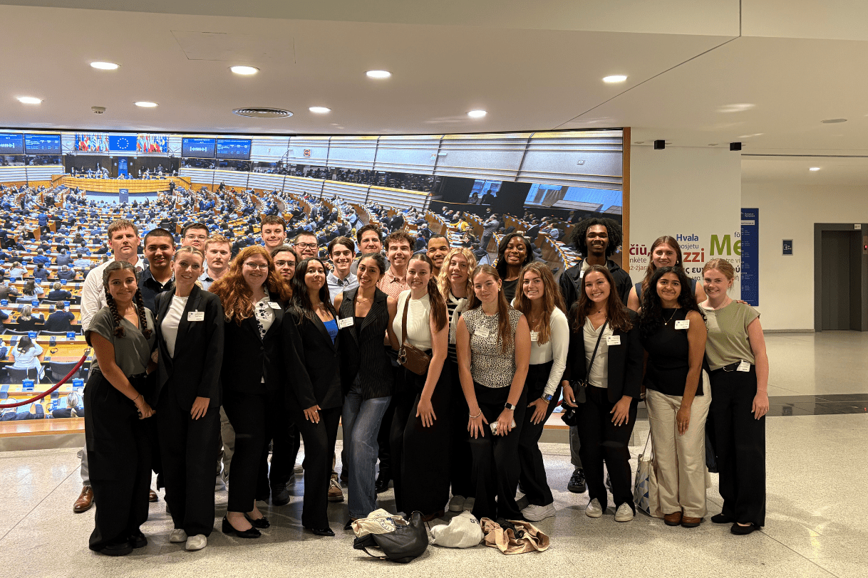 Madisonians posing together at the European Parliament during the "International Relations in Brussels" program in July 2025.