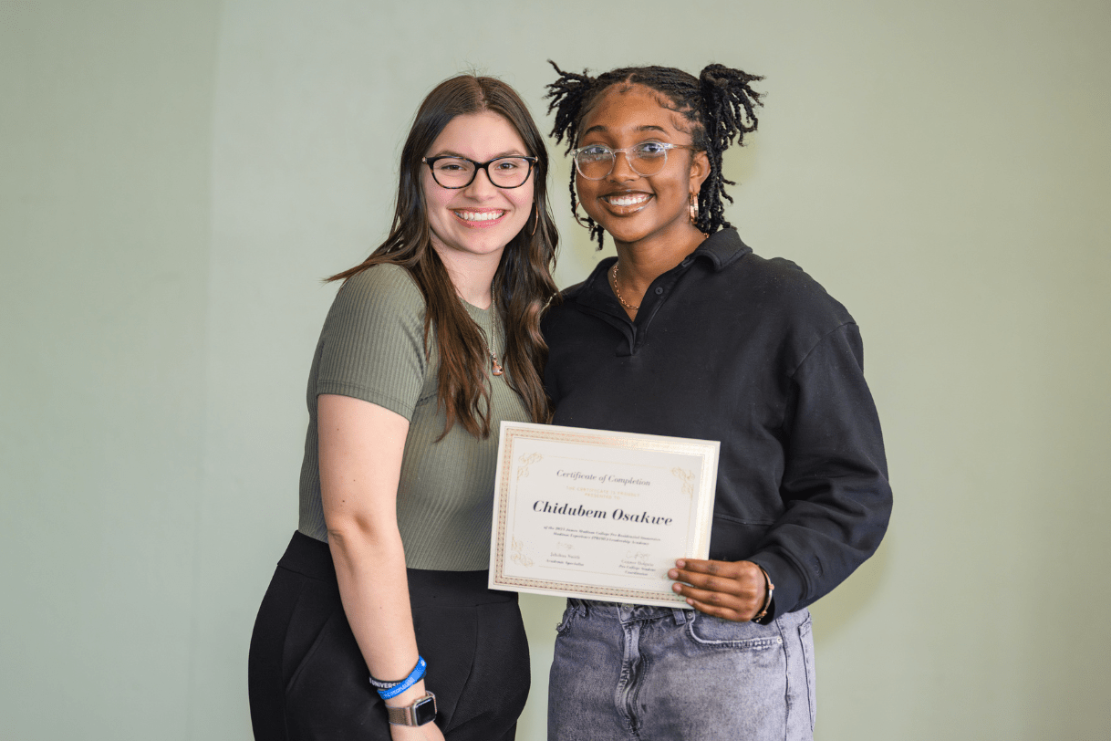 PRIME participant accepting a certificate from student coordinator Conner Holguin during the 2025 Leadership Academy closing ceremony.
