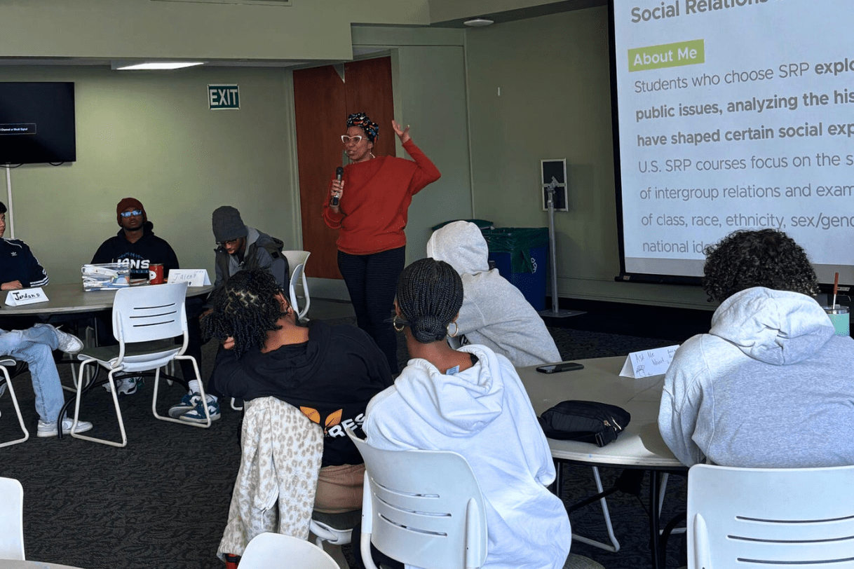 JMC Prof. Rashida Harrison presenting in front of PRIME students 