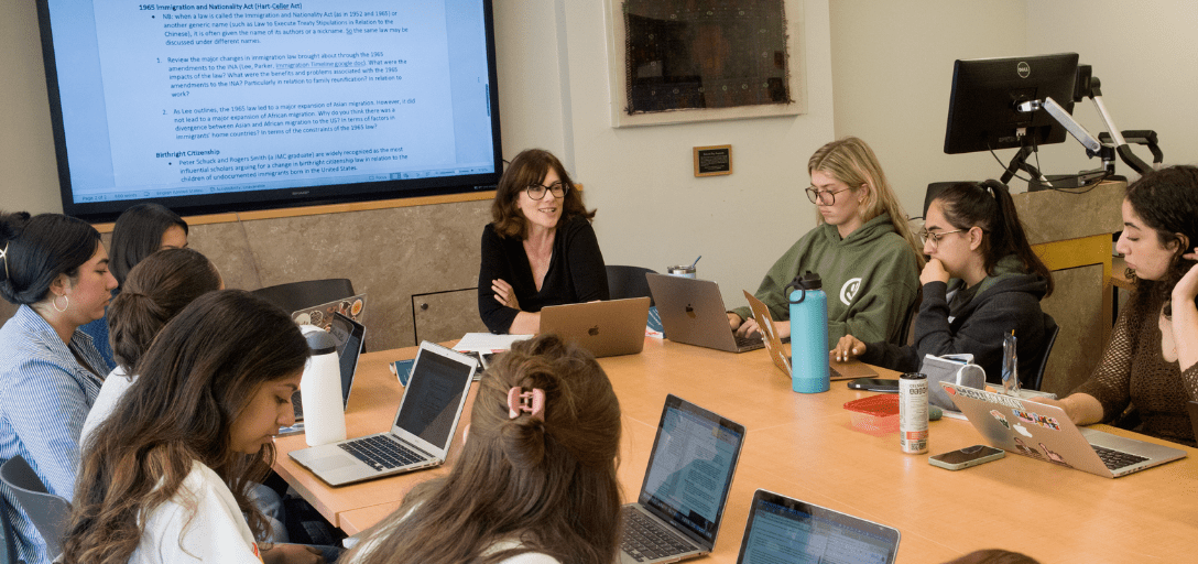 Photo shows JMC Prof. Anna Pegler-Gordon teaching a seminar-style class with a group of Madison students.