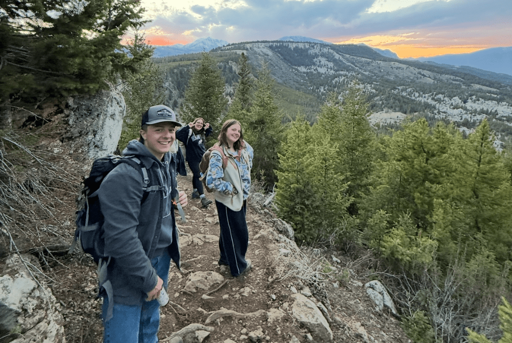 Photo shows a group of students on a hike in Yellowstone National Park.