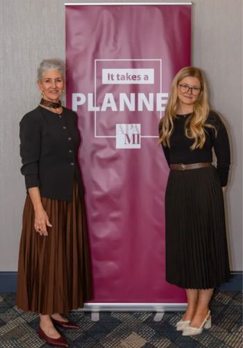 Abigail Carrigan in October 2025 when she received an award from the Michigan Association of Planning. She is standing with Andrea Brown, President of the Michigan Association of Planning