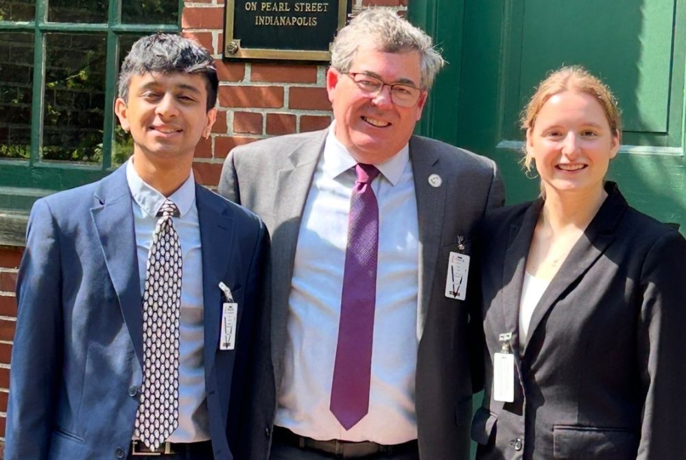 JMC students Grace Fitzgerald and Anish Danappanavar posing with Colin Bird, Consul General of Canada in Detroit.