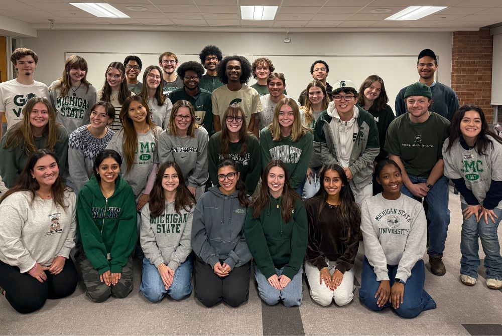 Group photo of James Madison College Student Senate. Roughly two dozen student posing in a large group.