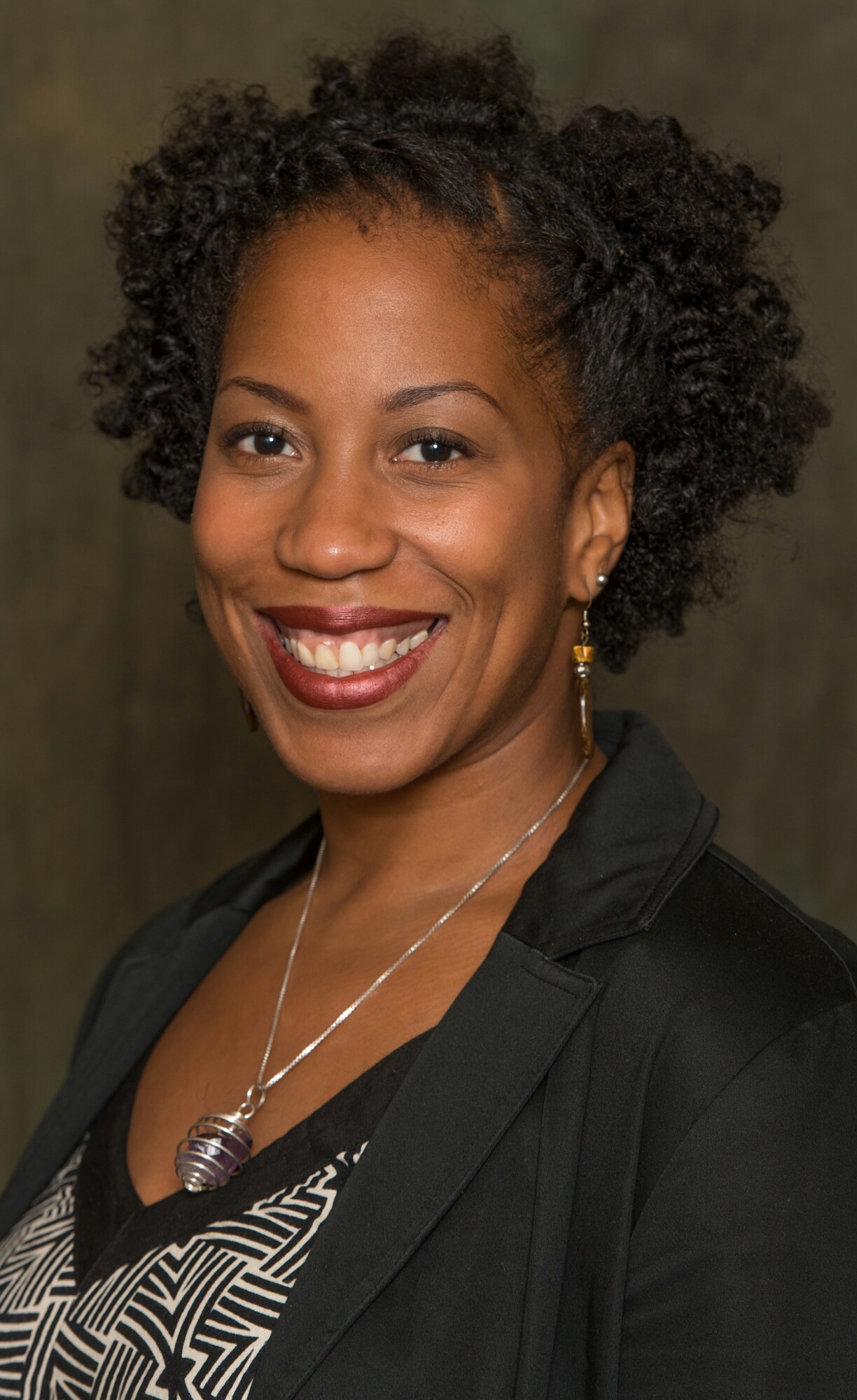 headshot of Rashida Harrison