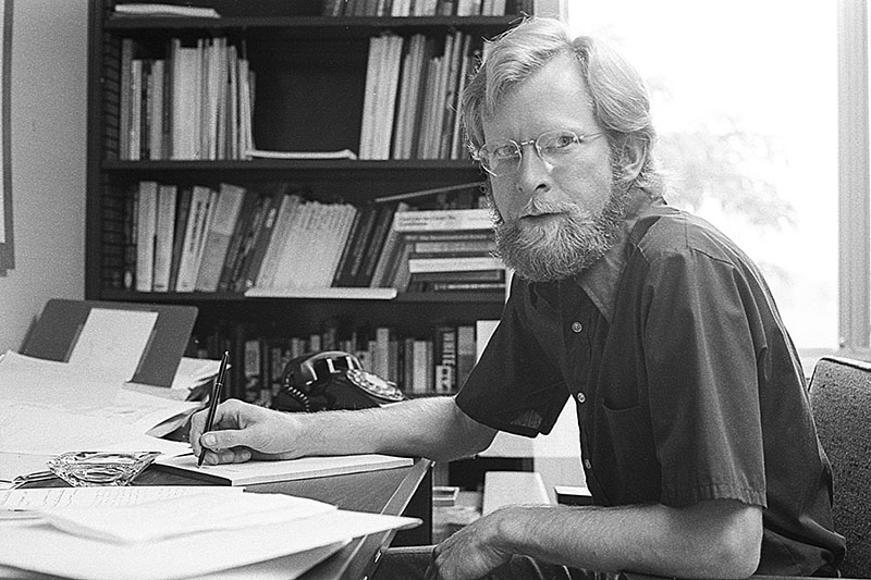 Jack Paynter sits at his desk