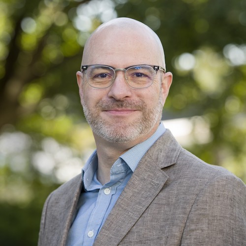 Headshot of Russell Lucas.