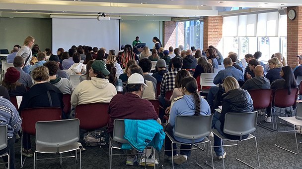 people seated inside Club Spartan