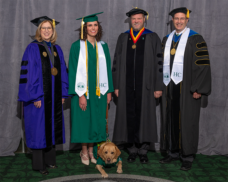 Allers poses with Interim President Woodruff, Interim Provost and Dean Long