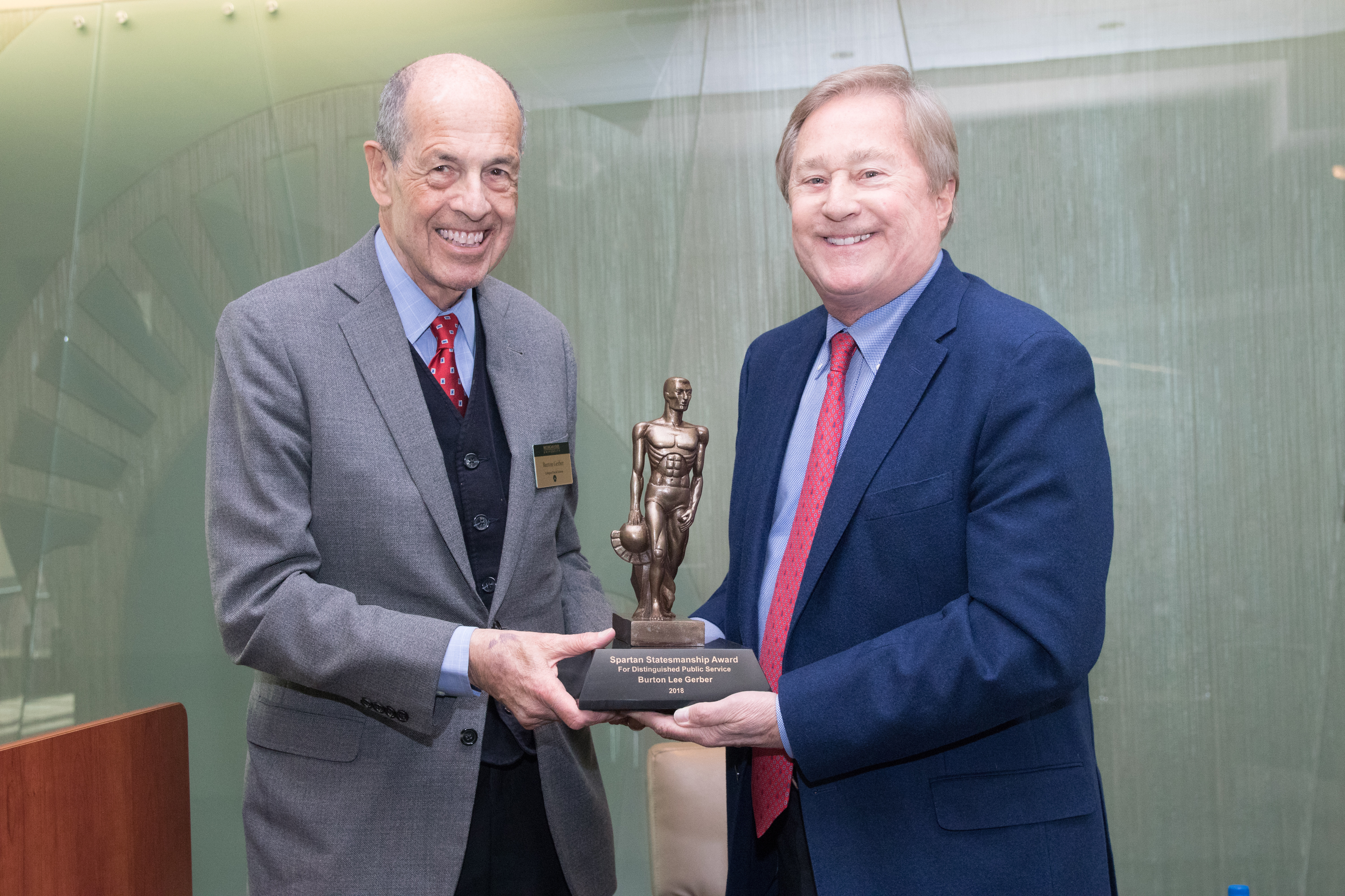 MSU alumnus Burton Gerber received the Spartan Statesmanship Award from former Michigan Gov. Jim Blanchard in 2018. Photo by Gary Shrewsbury.