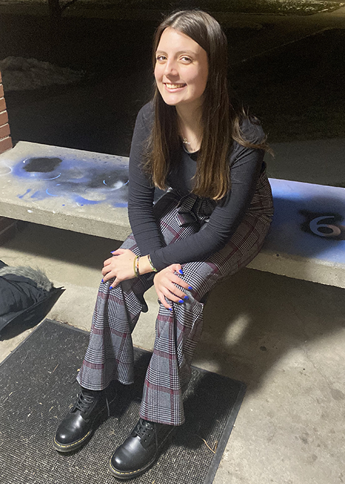 Caroline Curtright seated in a foyer