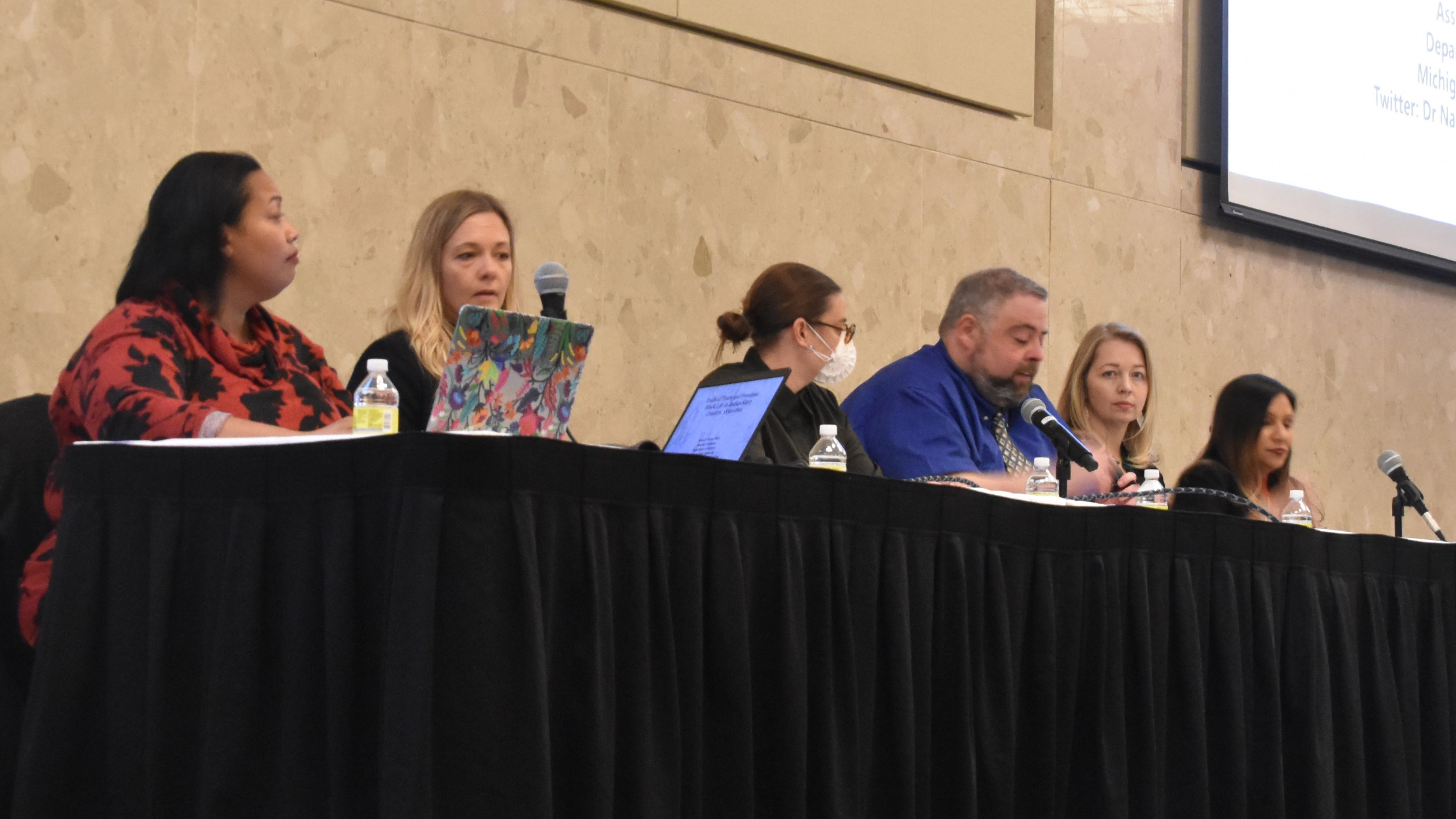 panelists sitting at table