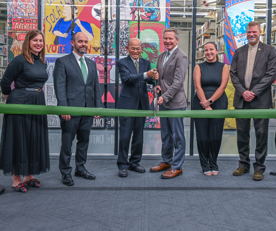 The ribbon cutting ceremony celebrating the newly renovated MSU Libraries' Special Collections. Left to right: Head of Special Collections Leslie McRoberts; Dean Neil Romanosky; primary donor for the renovation Dr. Keelung Hong; President Kevin M. Guskiewicz, Ph.D.; Morgan Schwarz, third-year history student and student employee; Interim Provost Thomas Jeitschko.