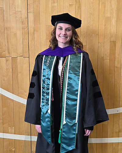 Katherine Held in her graduation cap and gown.