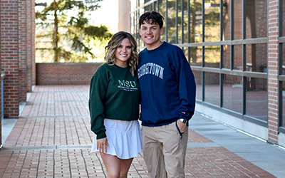 Daria and her twin brother are pictured as she wraps up law school and he heads to Georgetown for his master’s degree.