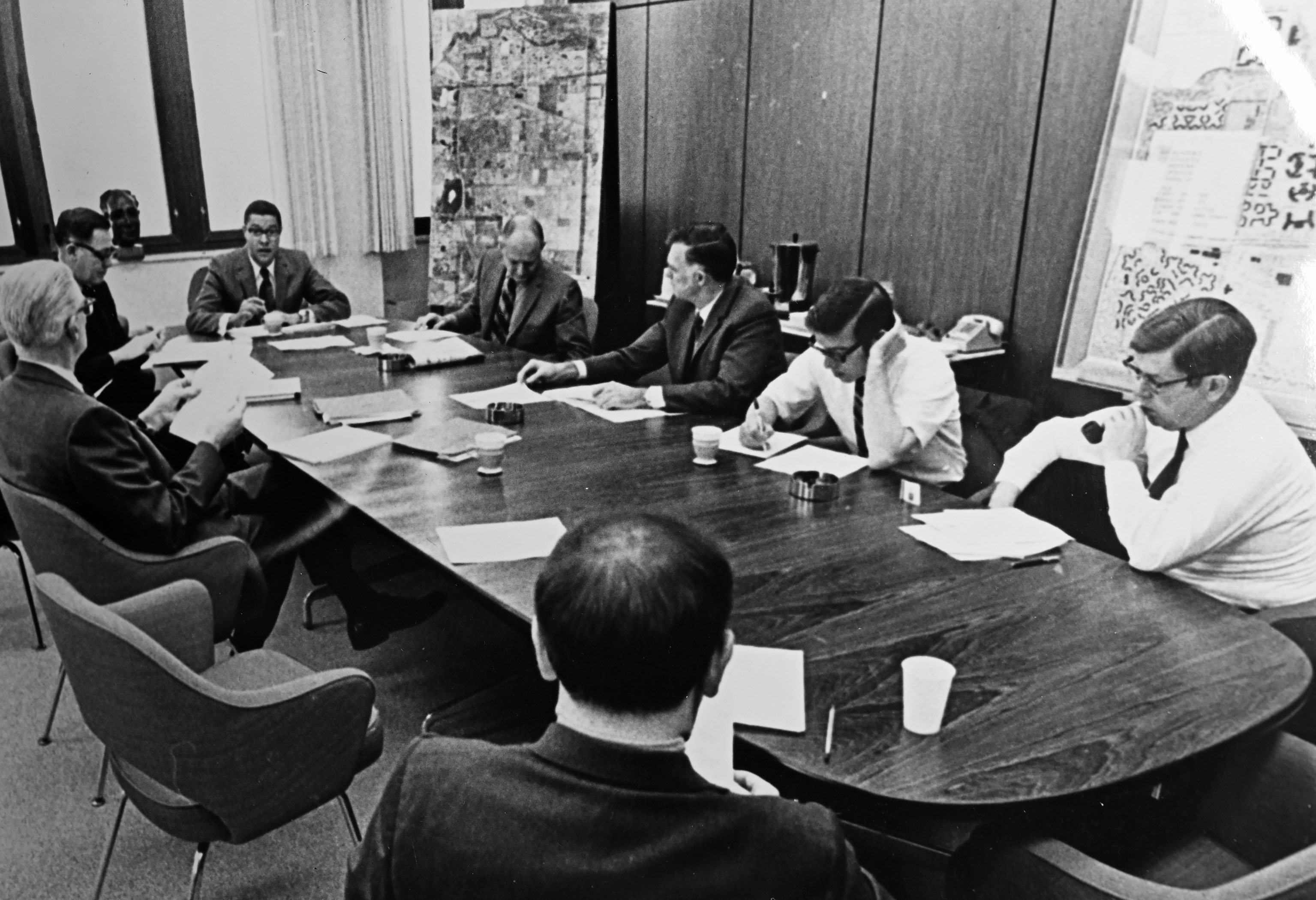 Wharton at board room table