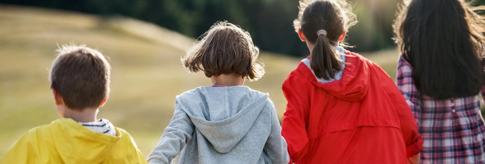 Four kids walk together