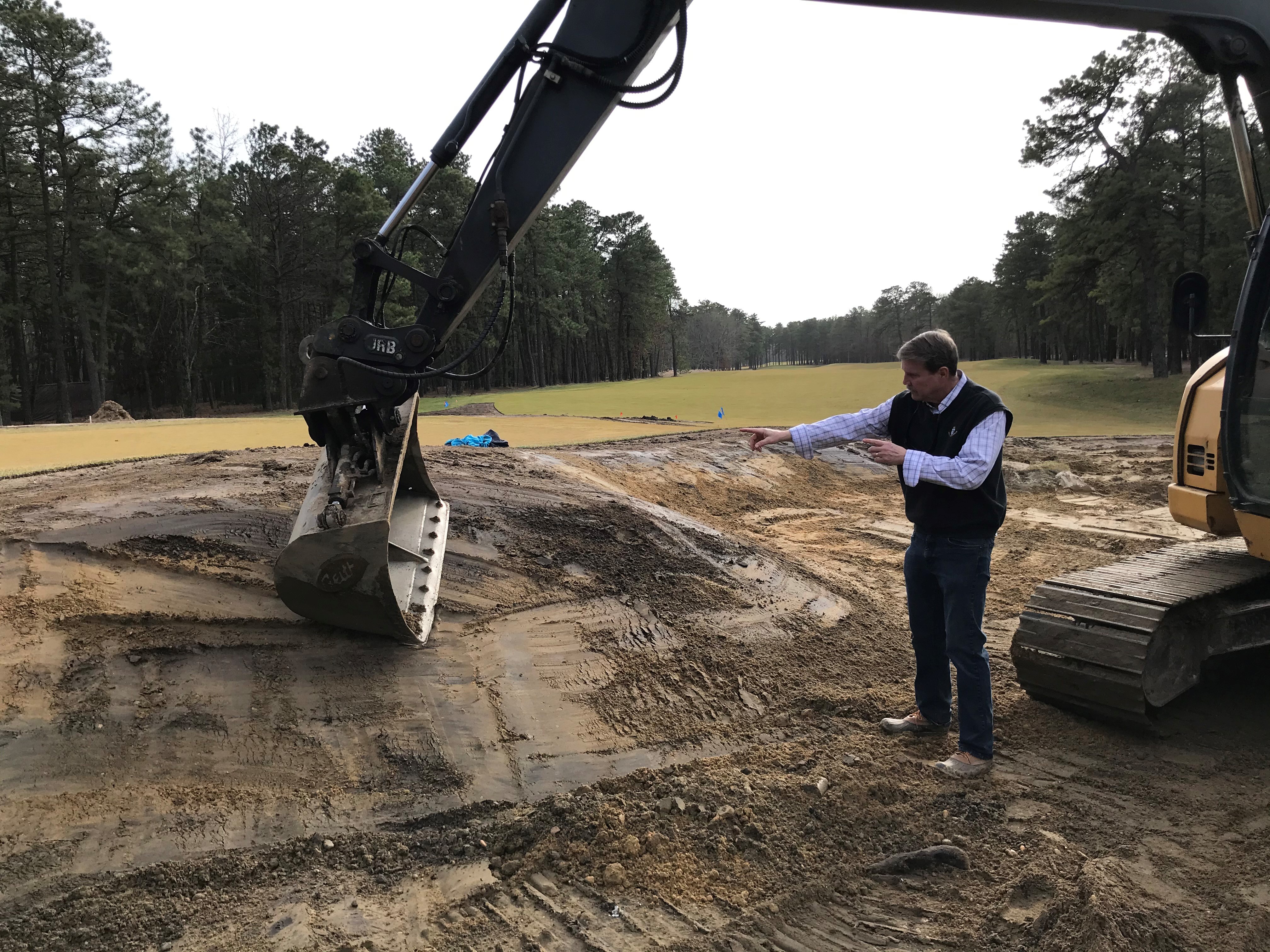 Photo of Ray Hearn during construction at Metedeconk National GC in New Jersey. Photo Credit: Raymond Hearn GC Designs 