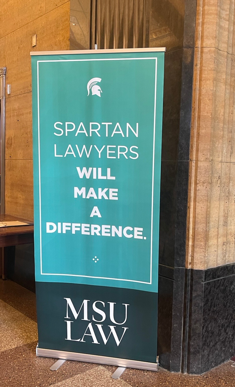 An MSU Law banner that says, Spartan lawyers will make a difference.