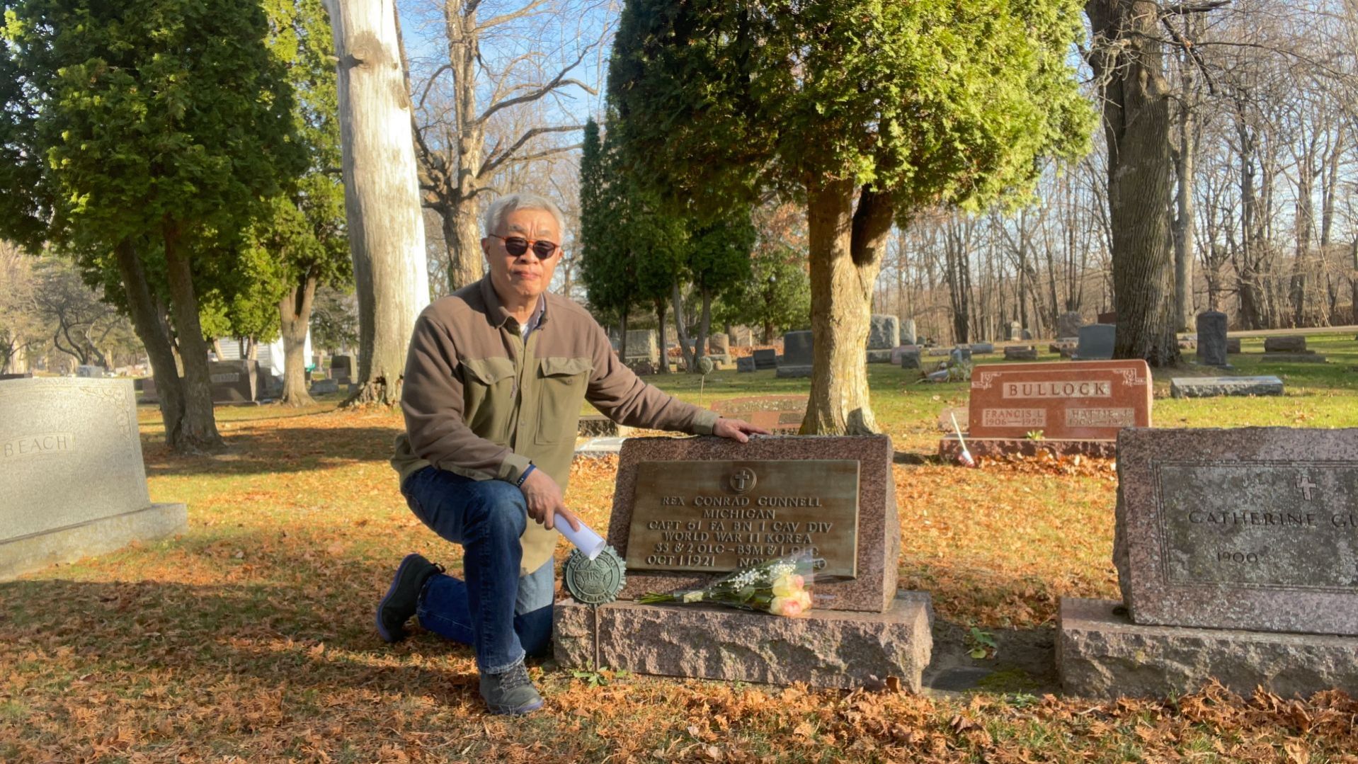 Myung visited five grave sites during his visit in November 2022. Here, he pays his respects to Captain Conrad Gunnel in Vassar, MI.