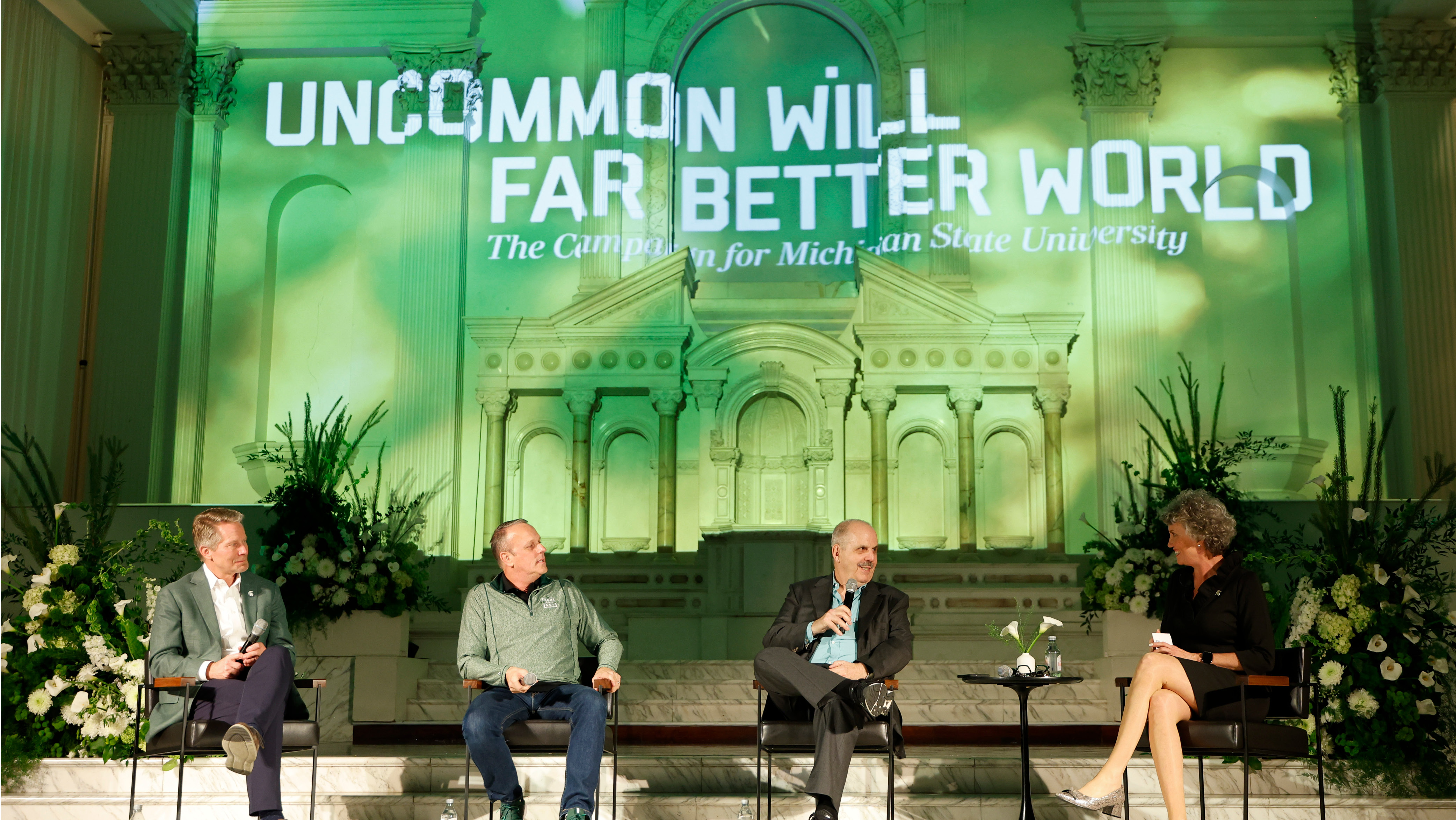 MSU President Kevin M. Guskiewicz, Ph.D. and Kim Tobin, vice president for University Advancement conduct a fireside chat with alums Brian O'Connor and Bill Mechanic.