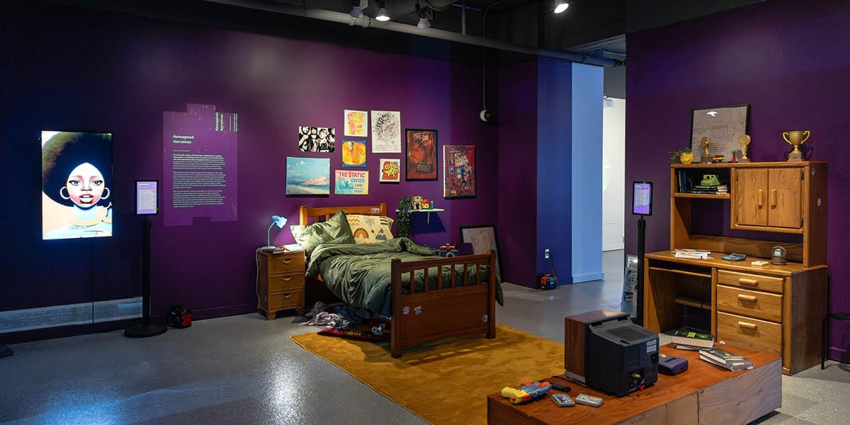 An AI-created bedroom display brought to life as part of the Blurred Realities exhibit at the MSU Museum.