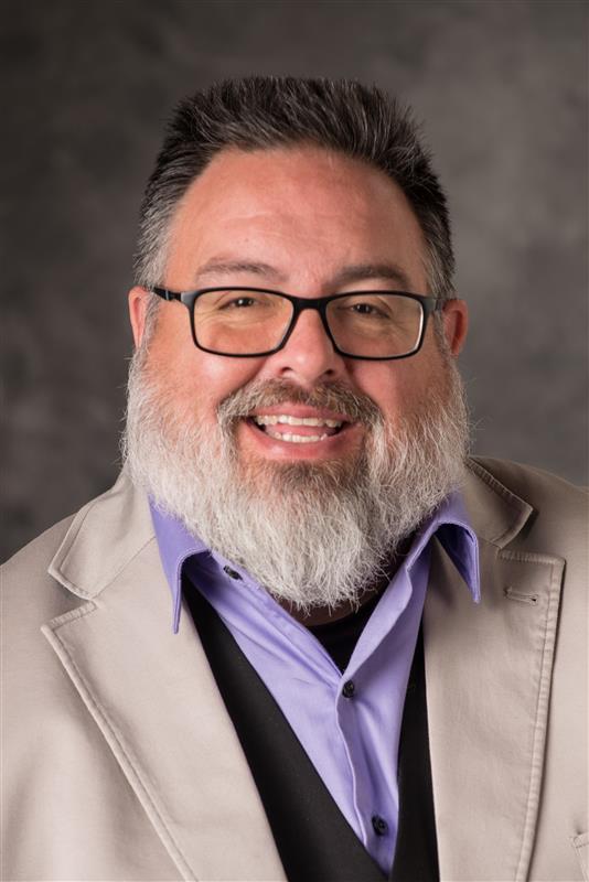 A headshot image of Kevin Leonard, who is the director of MSU's Native American Institute.