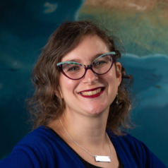 Headshot photo of Shannon Schmoll, who is the director of the Abrams Planetarium.